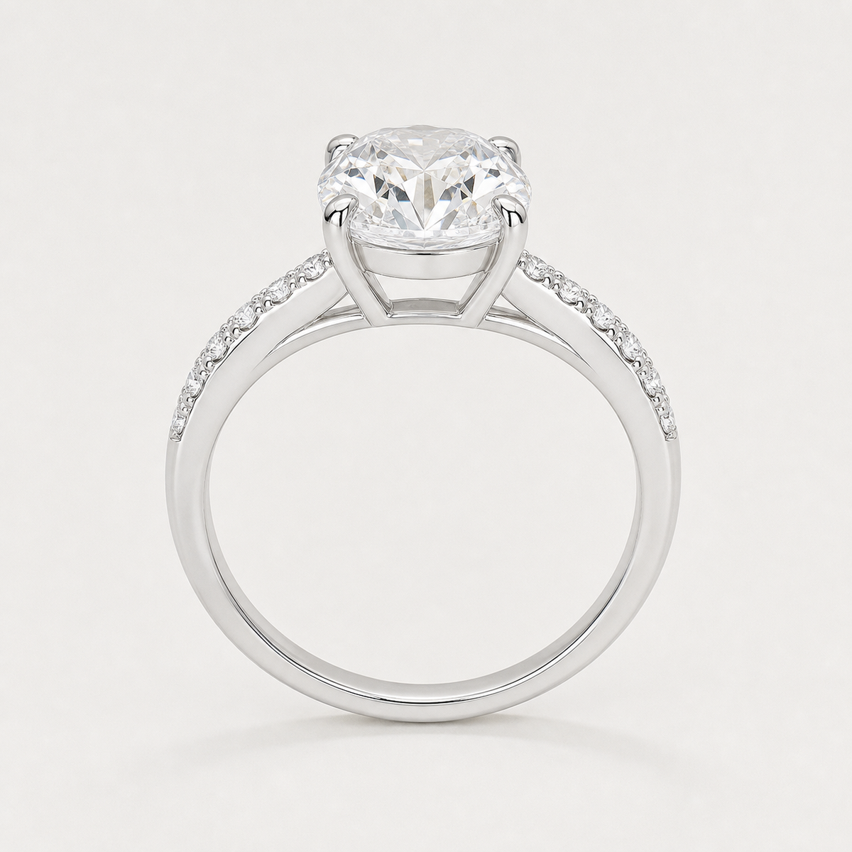 Vowmira 8 by 12 mm oval ice-cut pavé lab-grown diamond engagement ring, white gold tone profile view